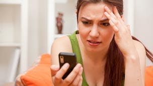 Woman annoyed with phone