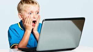 Shocked child with laptop