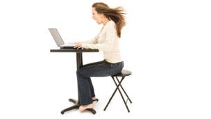 Woman using superfast broadband