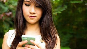 Teenage girl using phone