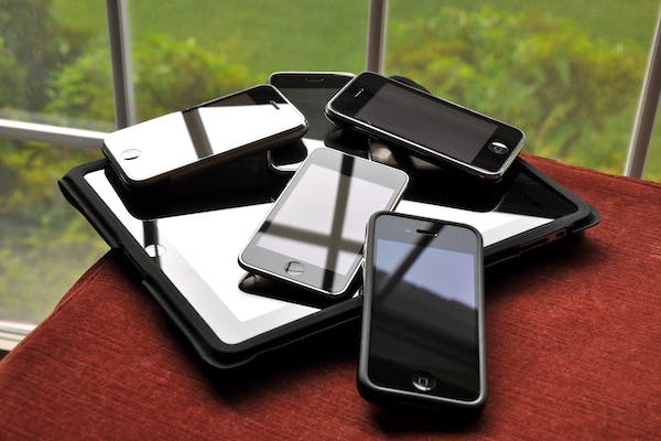 Pile of smartphones and tablet