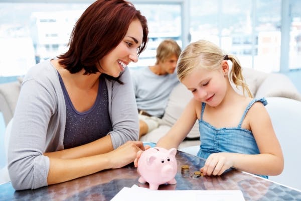 Mum and daughter counting money