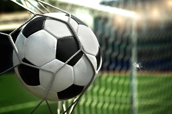 football going into goal