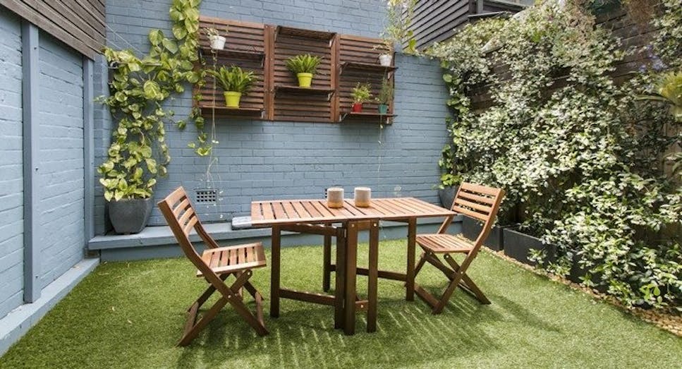 Walled garden with chairs and table