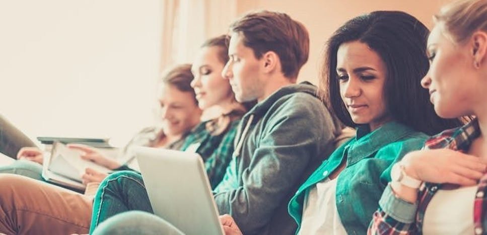 Group of young adults sitting