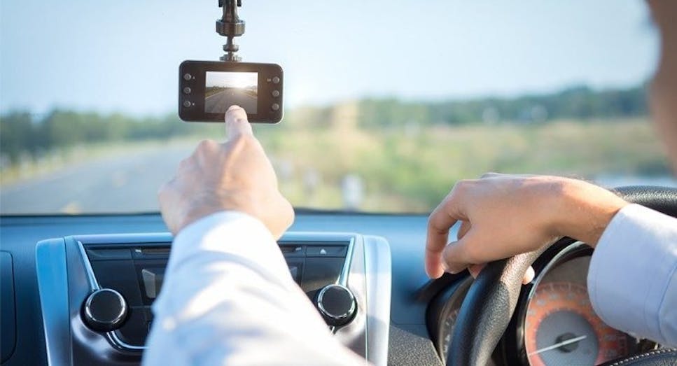 man driving with dash cam