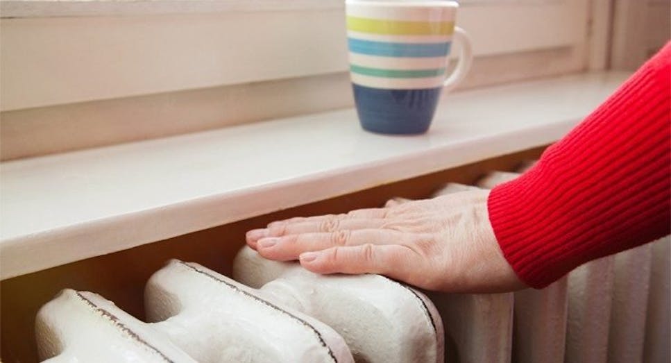 Hand on radiator