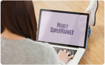Woman checking MoneySuperMarket website on laptop