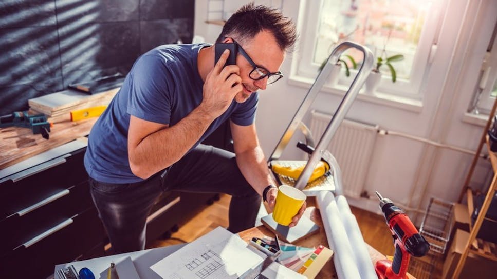 Man doing DIY in his kitchen