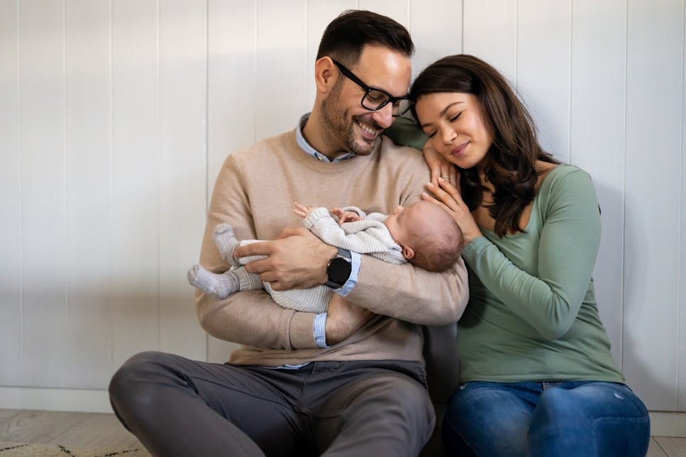 Happy couple with a baby
