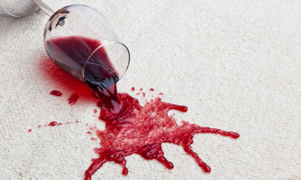Wine spilt on carpet