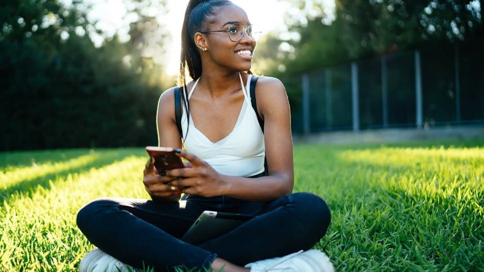 Girl sat on grass