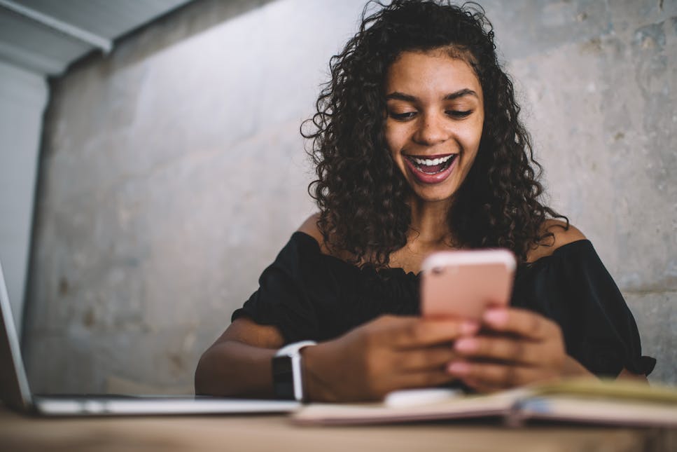 student looking at their phone