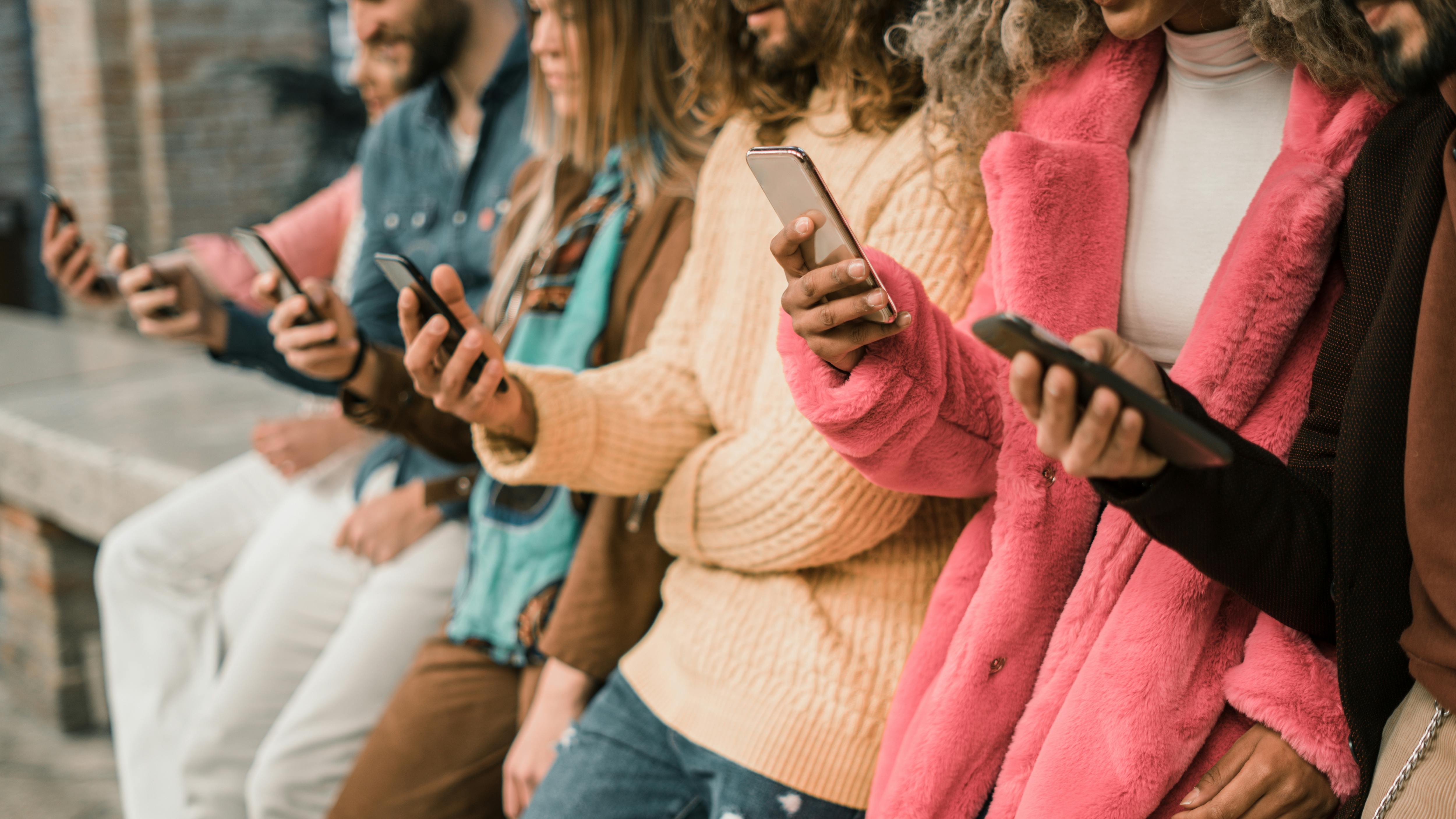 people using mobile phones
