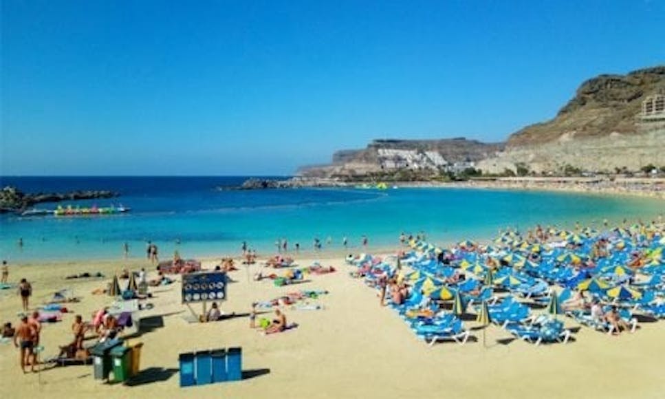 Sunbathers on a beach, Canary Islands