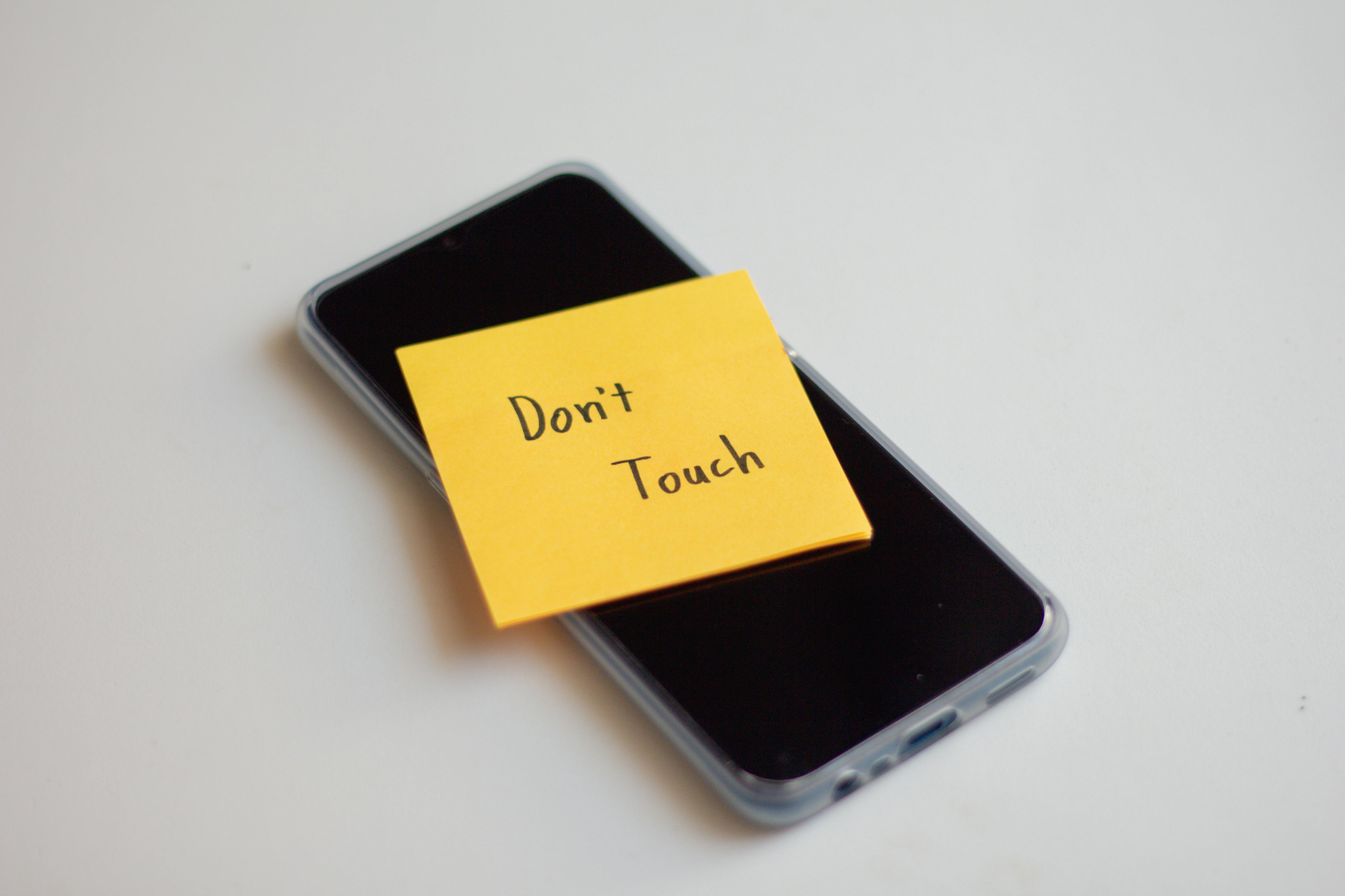 Mobile phone with post-it note
