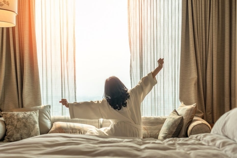 lady in hotel room