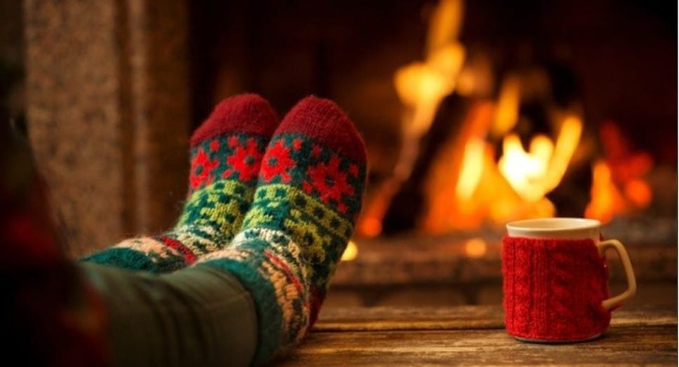 warm fire with woolly socks and hot drink