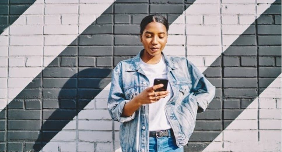 Young woman using her mobile