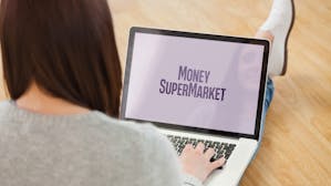 woman with laptop showing MoneySuperMarket on her lap