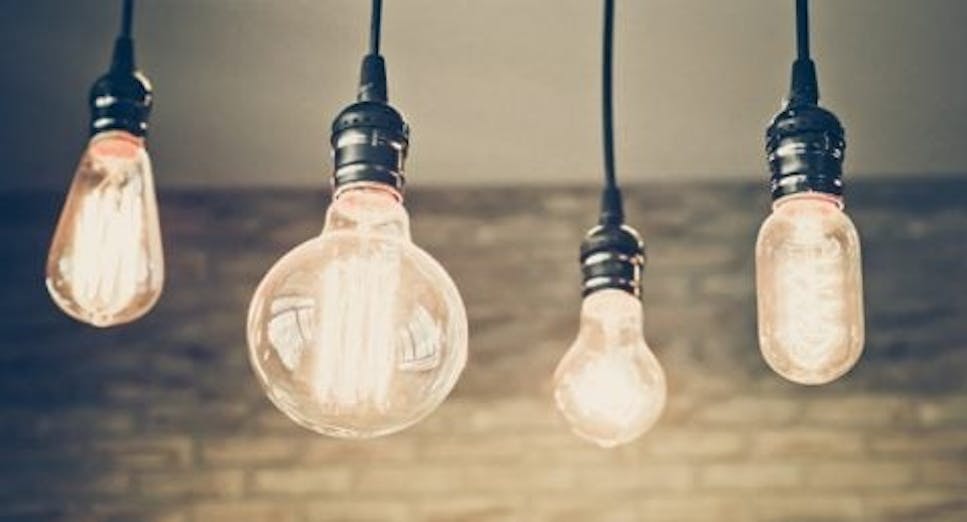 Light bulbs against a brick background