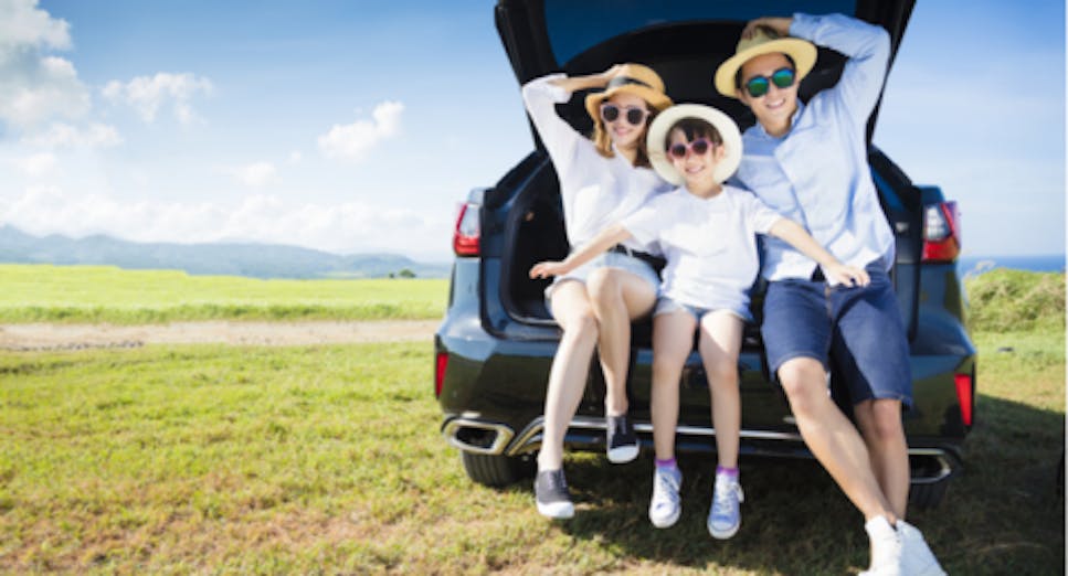 Family sat in the back of the car