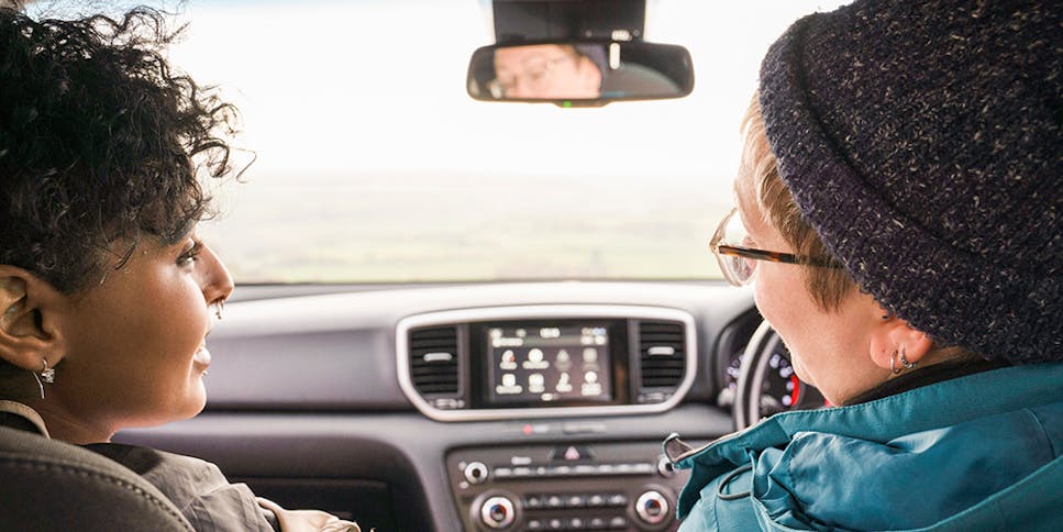 Parent and teen in car