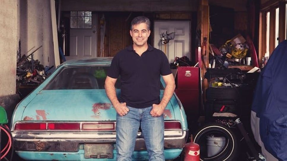 A man stood in his garage