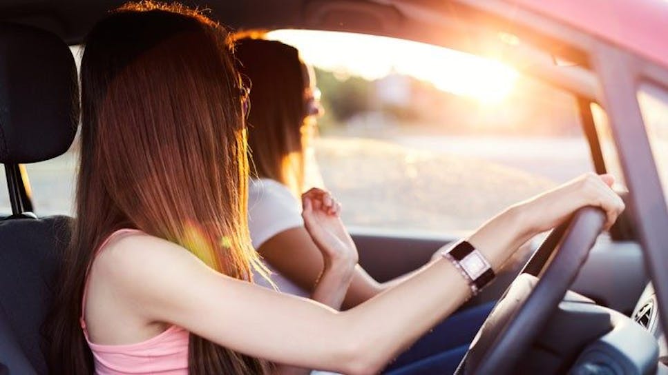 two young girls in a car