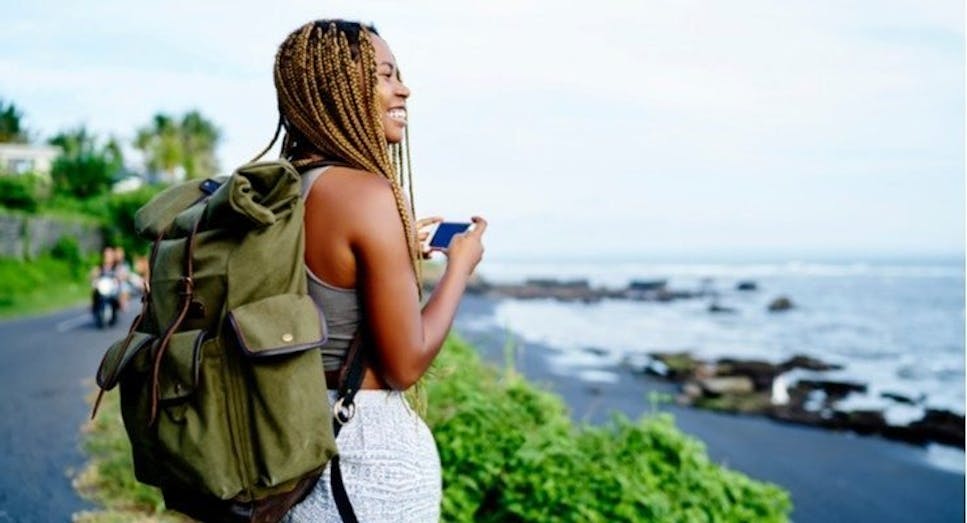 Female traveller taking a photo