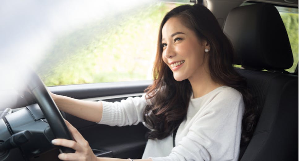 Woman driving car