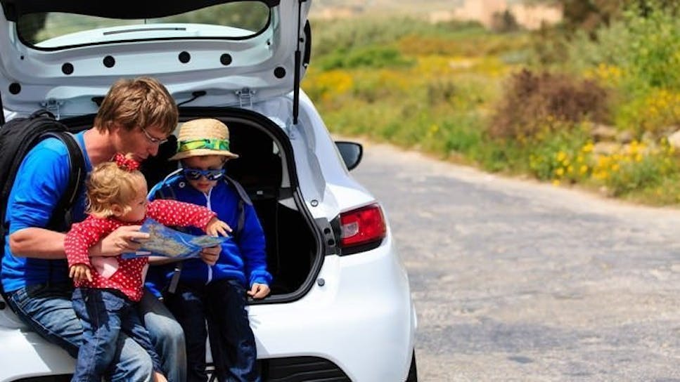 family sitting inthe car