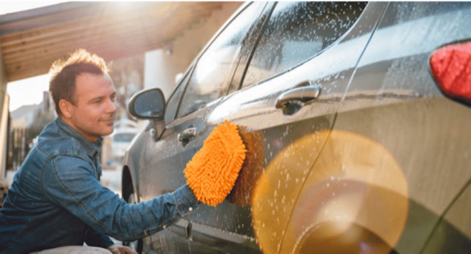 Man washing his car