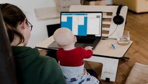 Parent working from home with baby