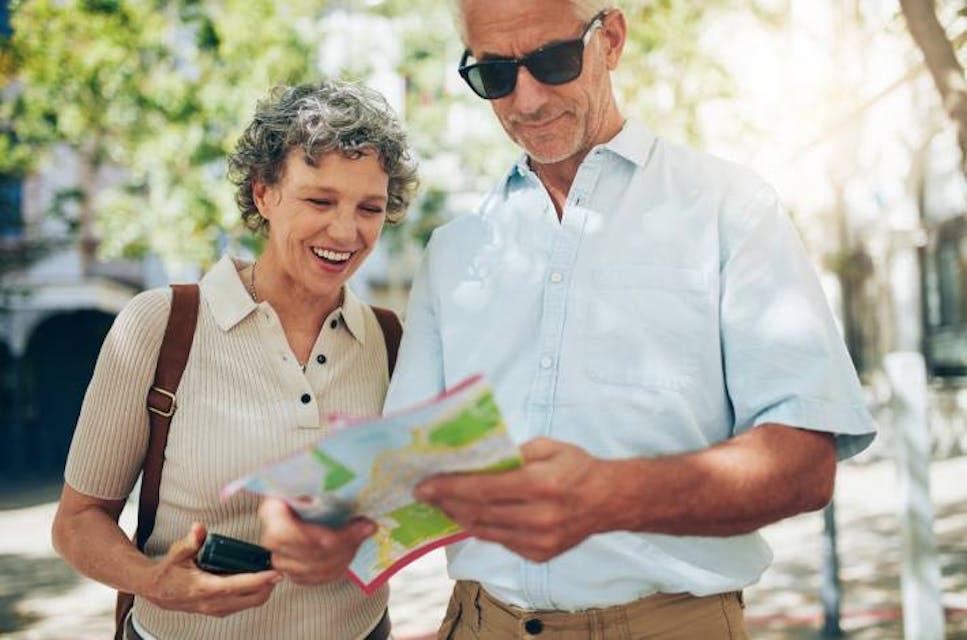 Man and woman looking at map