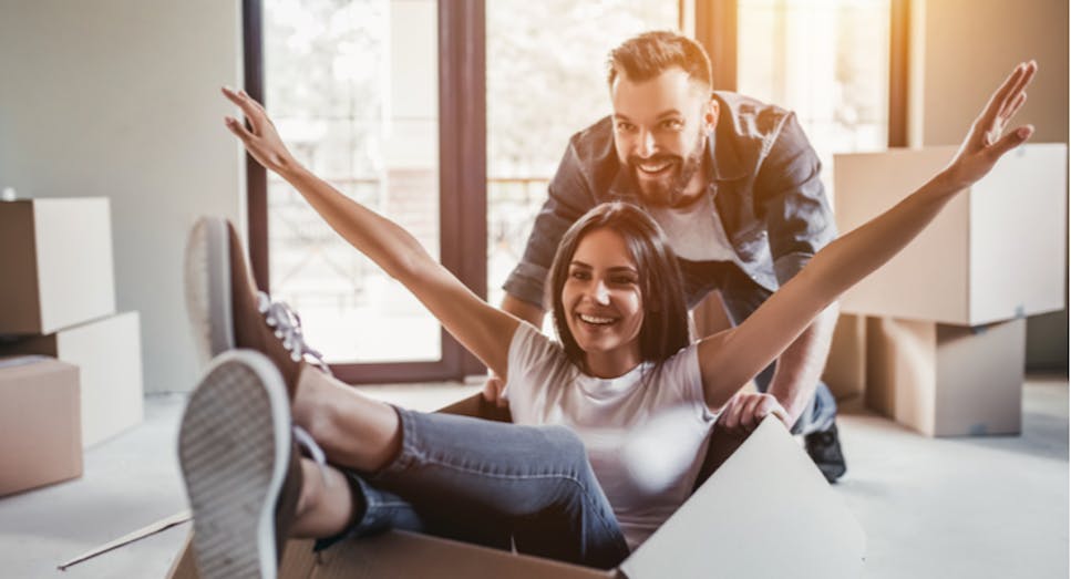 Couple moving into flat