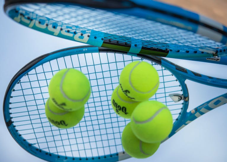 Tennis rackets and balls