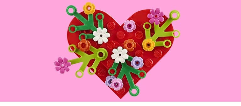 Image showing Lego pieces making up a heart shape with Lego flowers attached
