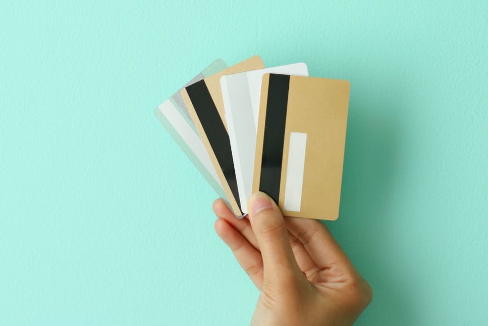 hero-igd-prepaid-card-credit-card-hand-green.jpg