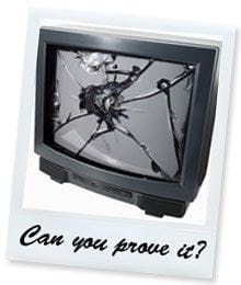 Polaroid of a smashed TV with the words "Can you prove it?"