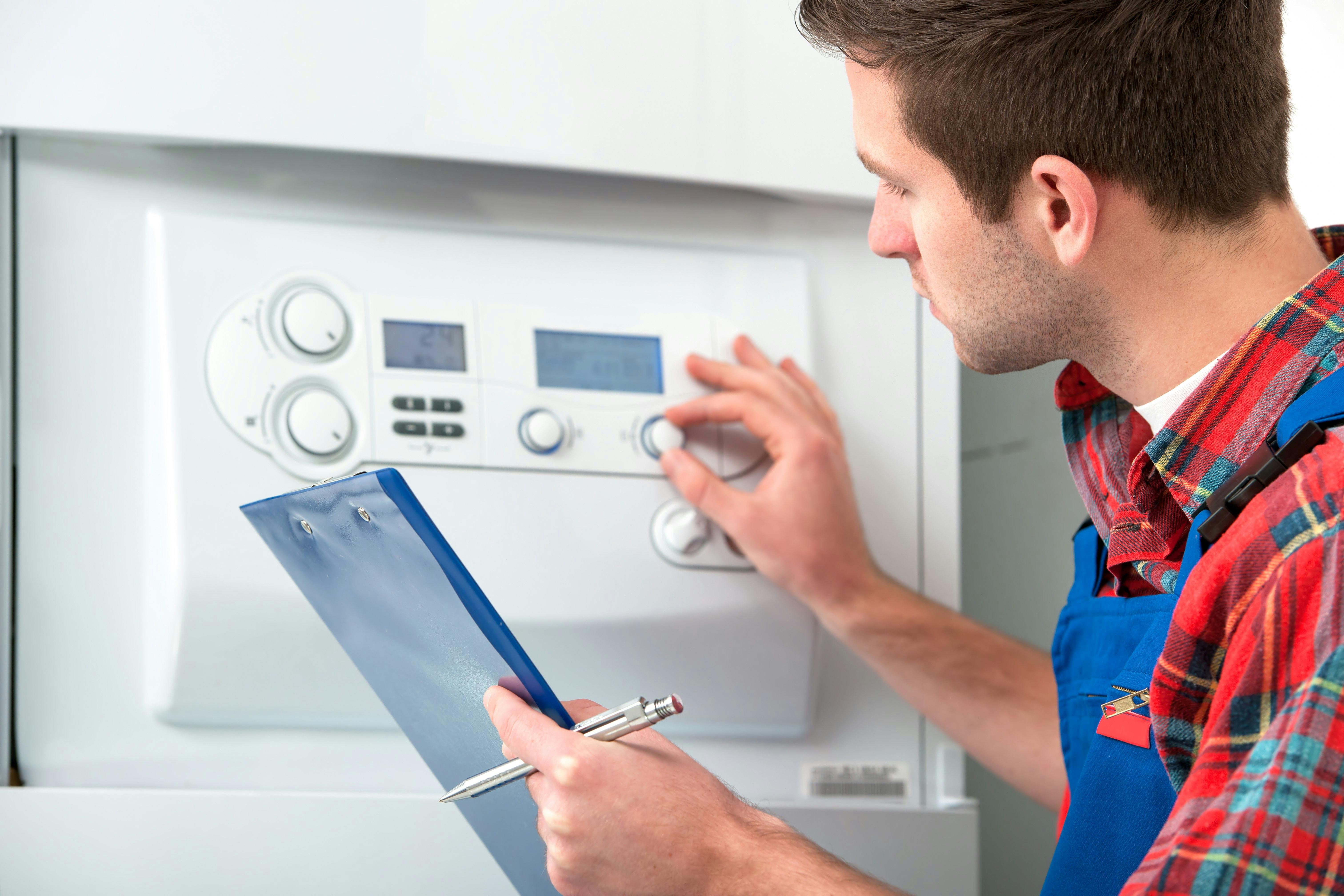engineer checking heat interface unit