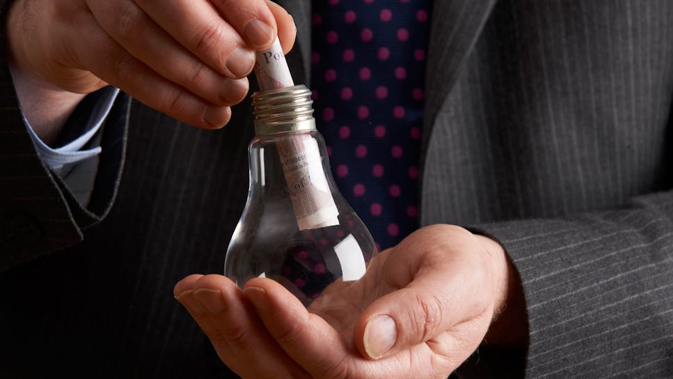 hero-homepage-energy-light-bulb-businessman-20-pound-note-cash.jpg