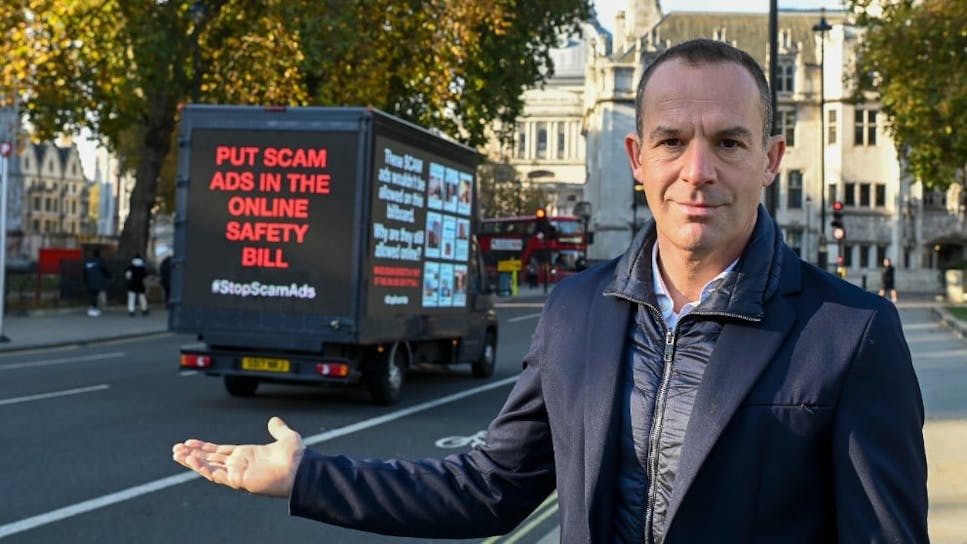 Martin Lewis “Scam Ad” van outside the Houses of Parliament.