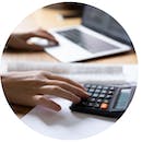Someone using a calculator.