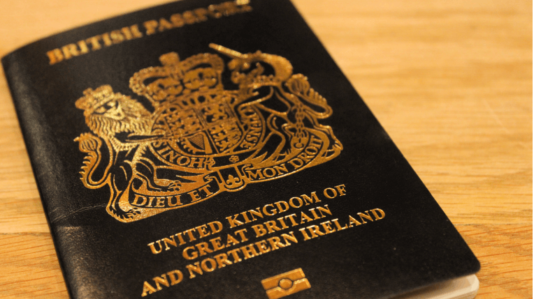 One passport, with the text at the top reading: "British Passport" and the text at the bottom reading: "United Kingdom of Great Britain and Northern Ireland".