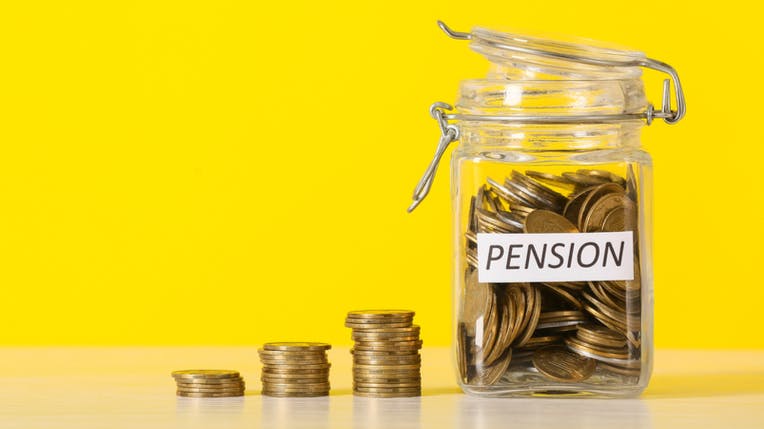 A jar of pennies labelled 'Pension'