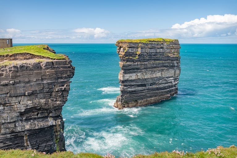Sea Stack (a post of rock in the sea) at Downpatrick Head in County Mayo, Ireland