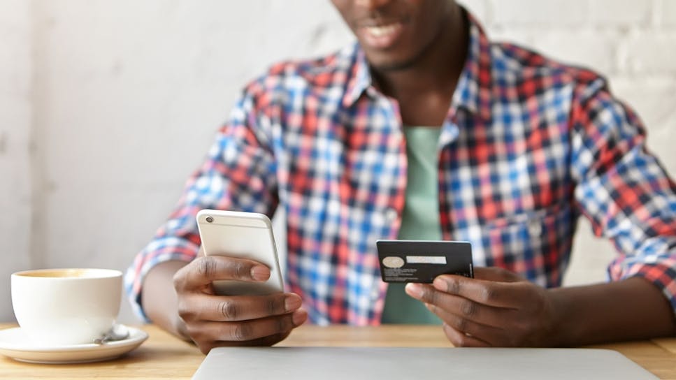 hero-homepage-man-laptop-mobile-phone-balance-transfer-credit-card.jpg