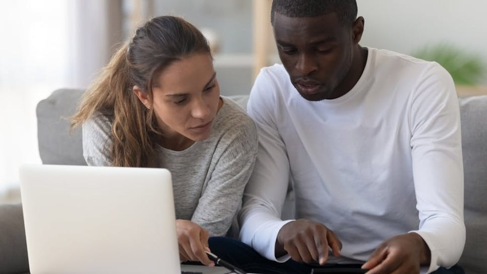 hero-homepage-couple-laptop-loans-bills-serious.jpg