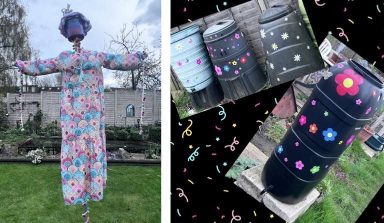 A scarecrow with a purple bucket head and a long pink dress, and some bins and water butts decorated with flower stickers